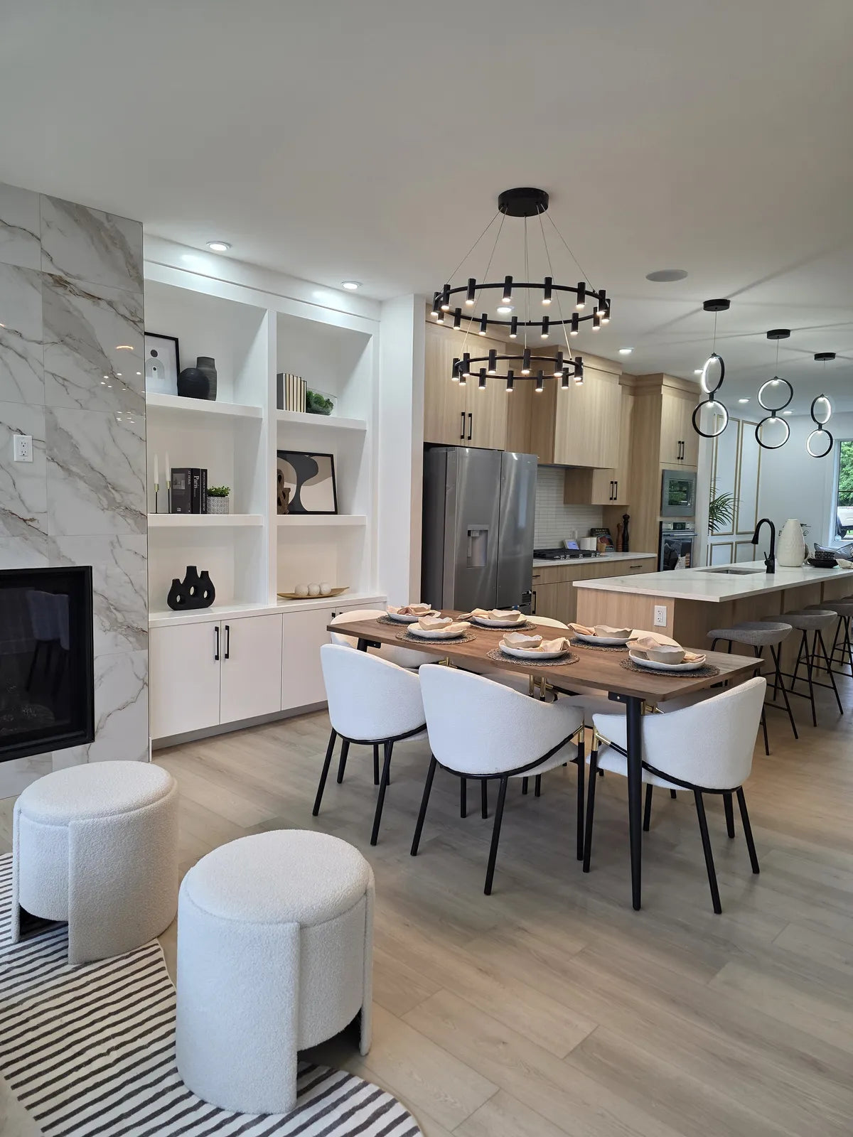 Open-plan dining and living area staged for viewing