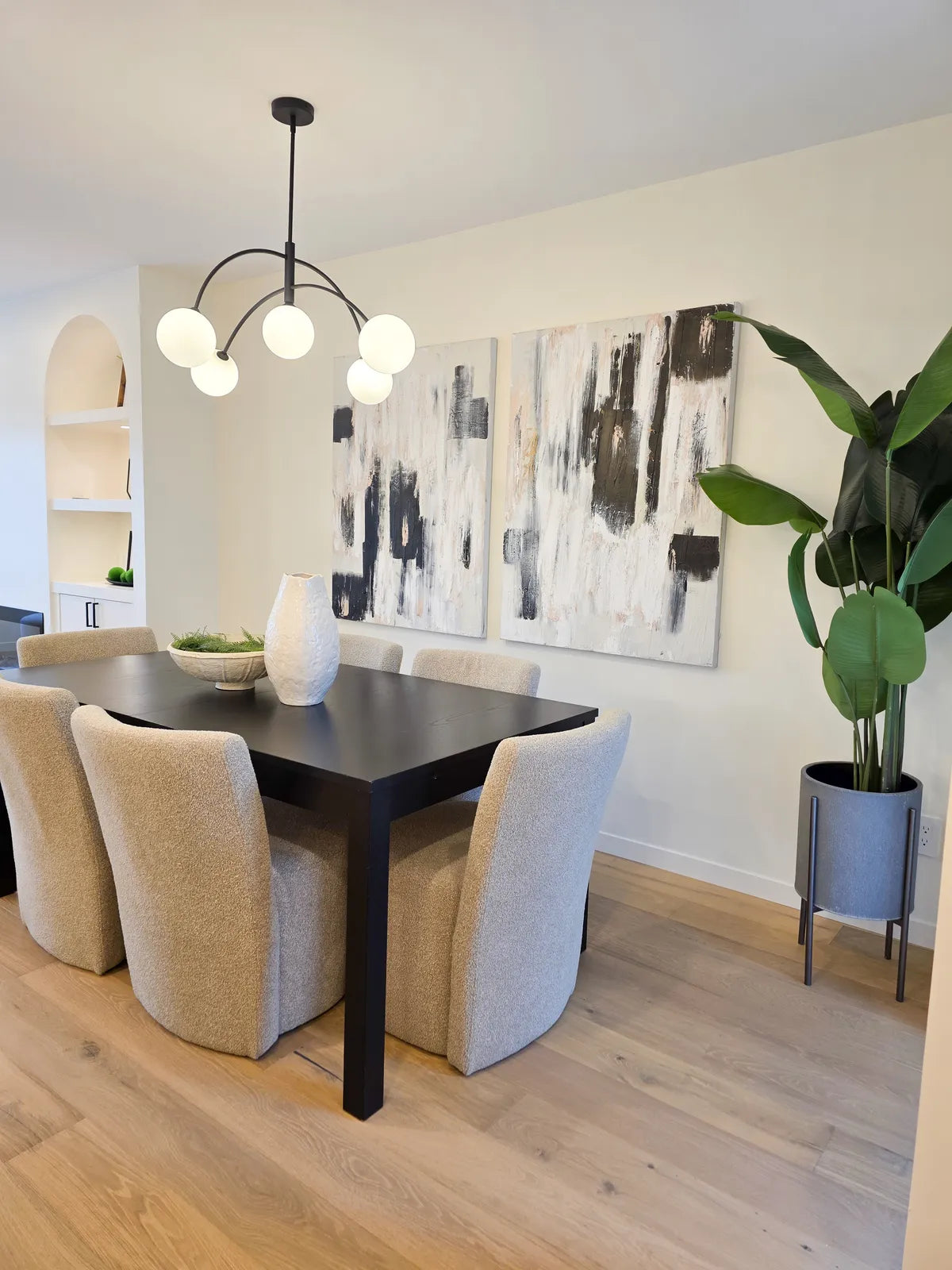 Dining room with black chairs, alternate angle