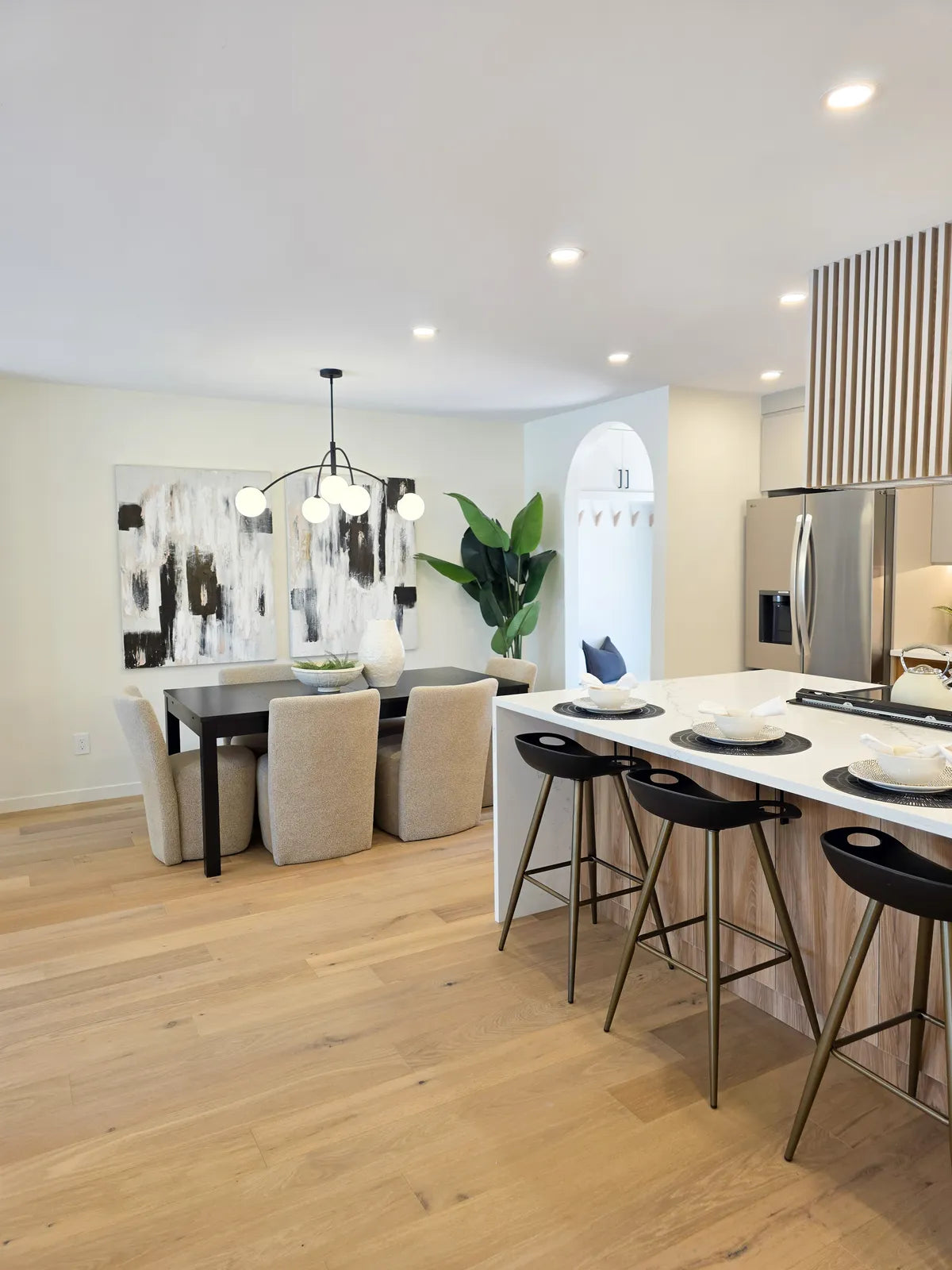 Kitchen and dining area with counter stools